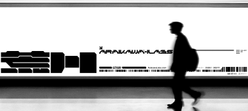 Arakawa Labs graphic installation with a figure walking past